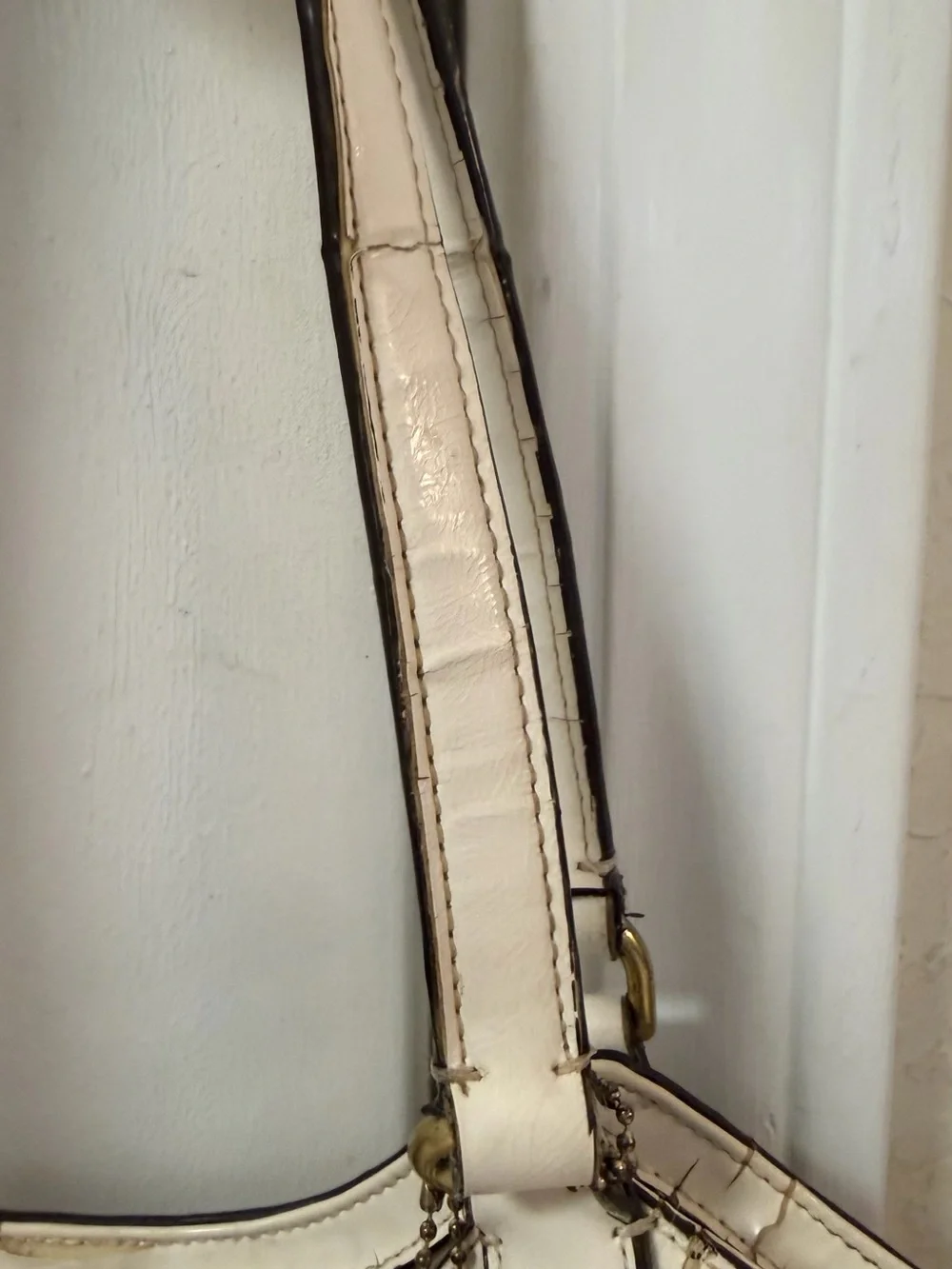 Coach Signature Canvas Beige Tote Bag with Ivory Trim handles are cracked!